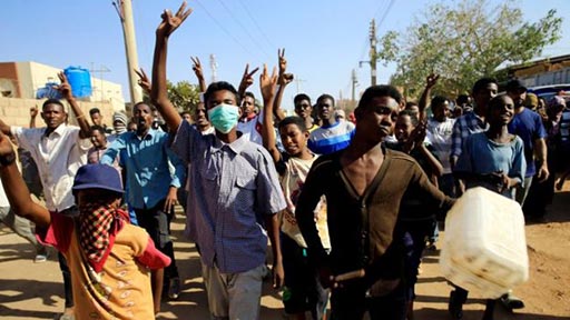 Sudanese demonstrators march during anti-government protests in Khartoum, Sudan, January 24, 2019
